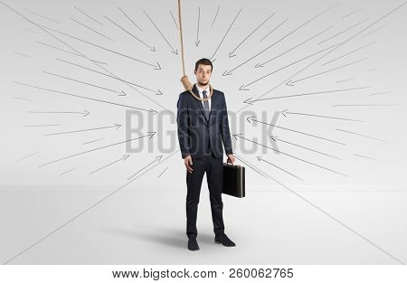 Hopeless young businessman trying to suicide with question signs concept