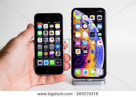 Paris, France - Sep 25, 2018: Male Hand Compare New Iphone Xs And Xs Max Smartphone Model By Apple C