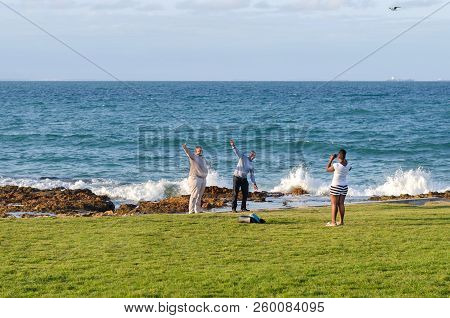 Port Elizabet, South Africa - September 12: Young Lady Take A Picture Of The Two Happy Man On Septem