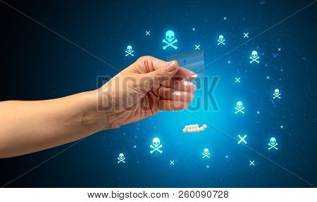 Female handing over pills with skull concept 