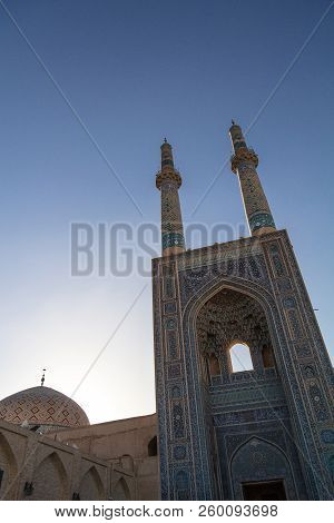 Jameh Mosque, With Its Distinctive Tiles Minarets, Seen At Sunset. Jameh Mosque Is One Of The Symbol