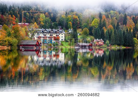 Misty Morning On Altaussee Village.misty Autumn Scene In The Morning. Mirror Reflection. Location: R