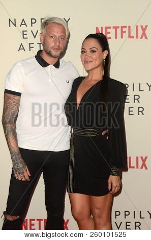 LOS ANGELES - SEP 20:  Sy Rhys Kaye, Camille Guaty at the 