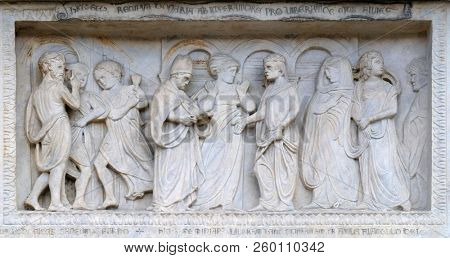 MODENA, ITALY - JUNE 04: Panel with episodes of the life of St. Geminiano, by Agostino di Duccio of about 1442, Modena Cathedral, Italy on June 04, 2017.