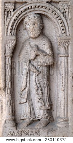 MODENA, ITALY - JUNE 04: Saint Matthias the apostle, bass relief by followers of Wiligelmo, Princesâ Gate, Modena Cathedral, Italy on June 04, 2017.