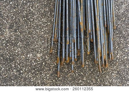 Background Of Old Metal, Mild Steel Round Bar. Reinforcement Steel Mesh Background. Background Textu