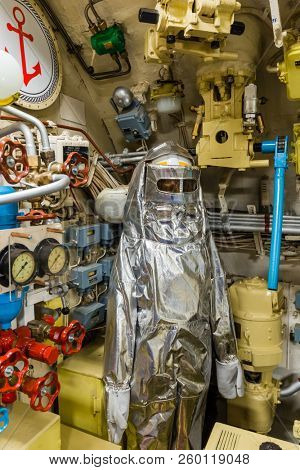 Moscow, Russia - May 04, 2018: Fire suit in Russian Soviet submarine in museum of naval forces.