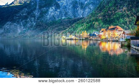 Scenic View Of Famous Hallstatt Mountain Village With Hallstatter Lake. Sunnny Autumn Evening On Hal