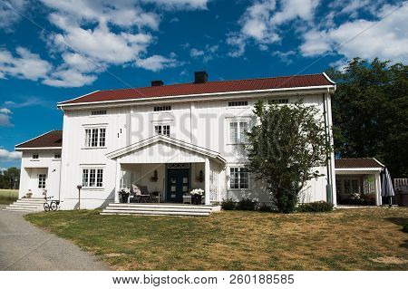 Hamar, Hedmark, Norway - 26 July 2018: Living House Under Cloudy Blue Sky