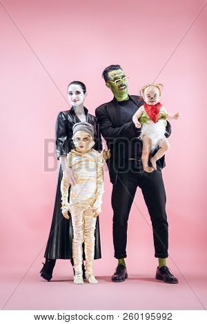 Halloween Family. Happy Father, Mother And Children Girls In Halloween Costume And Makeup. Bloody Th