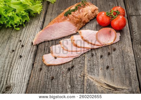 Veal Roast With Vegetables. Organic Products On A Wooden Table