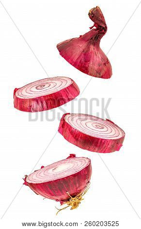 Slices Red Onion Flying Isolatedon White With Clippingpath. Crative Flying Vegetable