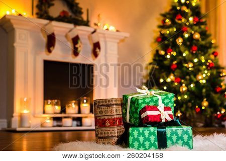 Some Nice Christmas Presents In A Living Room Filled Up With Winter Holidays Magic Atmosphere. Decor