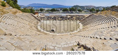 Panoramic View Of The Remains Of The Amphitheatre Of Halicarnassus With Kumbahce Bay And The Castle 