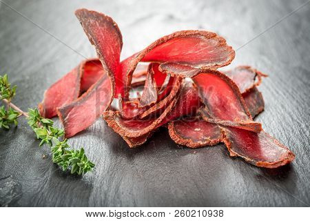 Armenian Basturma. Beef Cured And Spice. Organic Products On A Wooden Table