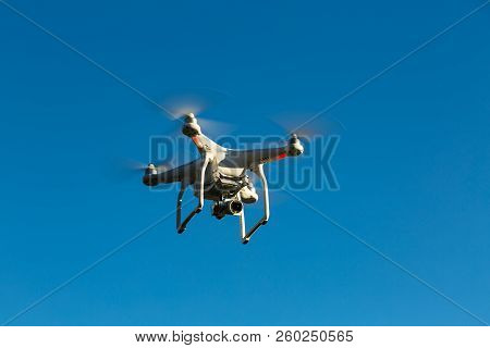 Niedernhausen, Germany, December 29th, 2016, Quadcopter Drone Dji Phantom Flying Into Blue Sky