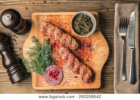 Georgian National Dish Of Meat Lulia-kebab On A Wooden Board