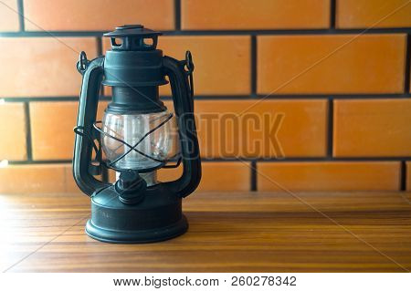 Classical Paraffin Oil Lamp Put On Wooden Table