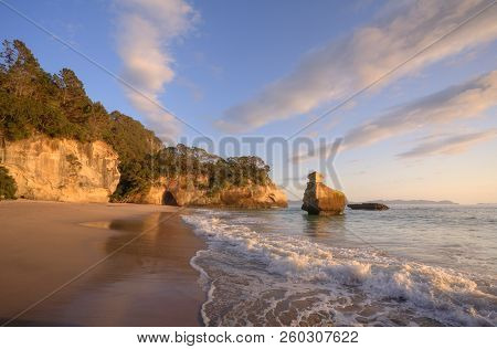 Cathedral Cove, Coromandel Peninsula, With Beautiful Early Morning Light On The Rocks.