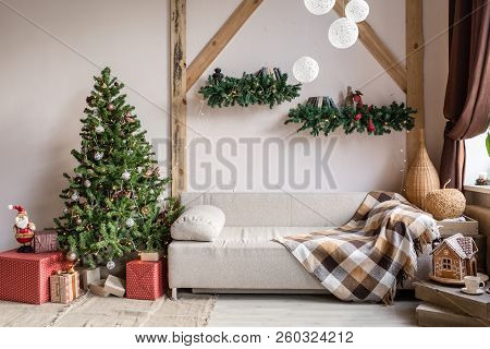 Xmas In Morning Living Room. Sofa Bed In Christmas Interior. Celebrate The New Year And Holidays. Ch