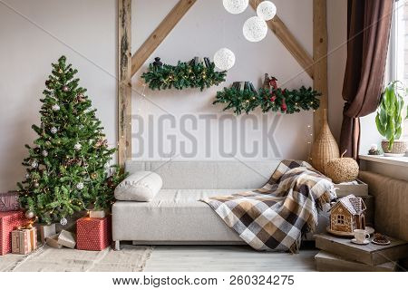 Xmas In Morning Living Room. Sofa Bed In Christmas Interior. Celebrate The New Year And Holidays. Ch