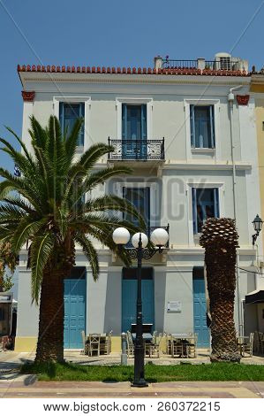 Typical White Building With Blue Sales In Nafplio. Architecture, Travel, Landscapes, Cruises. July 8, 2018. Nauplion Argolida Greece.