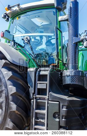 Tractor For Farm Work, Modern Agricultural Transport Working In The Field, Modern Tractor Close-up