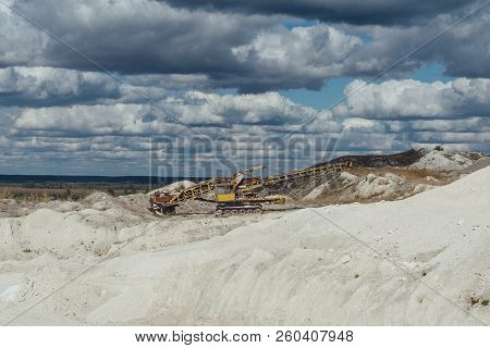 Rotary Bucket-wheel  Excavator Working In Chalky Quarry.