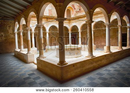Lower Cloister Of The Carthusian Monastery Of Escaladei, Founded In The 12th Century. Located In Cat