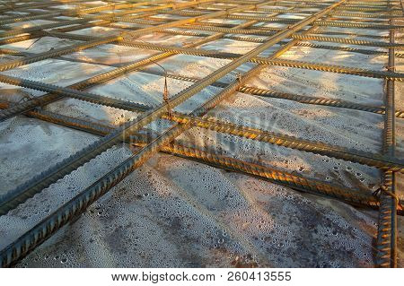 Construction Workers Fabricating Steel Reinforcement Bar At The Construction Site