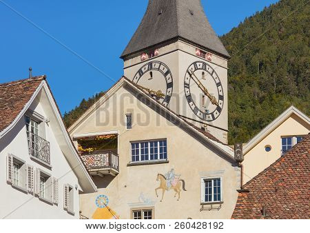 Chur, Switzerland - September, 27 2018: Buildings Of The Historic Part Of The City Of Chur, Clock Of