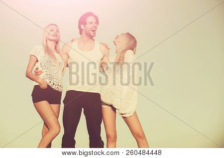 Man With Muscular Body With Twins. Girl And Happy Women With Boyfriend Outdoor. Love And Romance. Bl