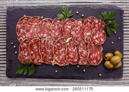 Saucisson Sec Delicious French Salami On A Wooden Background