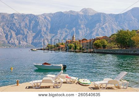 Summer Mediterranean Landscape. Montenegro, Adriatic Sea. View Of Bay Of Kotor And Stoliv Village. V