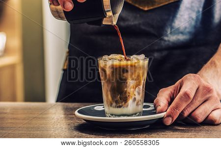 Close-up A Barista Making Fres Ice Coffee On Barcounter