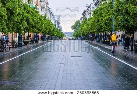 Vilnius, Lithuania - May 17, 2014: City Center Of Vilnius. Wet Gediminas Avenue After Heavy Spring R