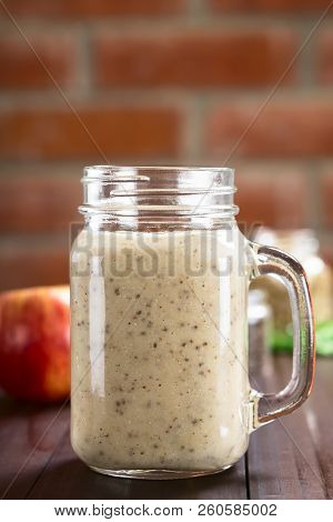 Fresh Homemade Vegan Apple, Oatmeal And Chia Seed Smoothie In Mason Jar (selective Focus, Focus On T