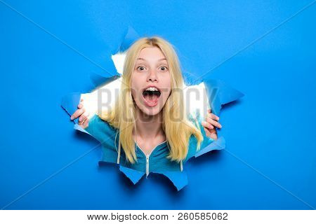 Beautiful Sexy Girl Looking Through Hole In Paper. Attractive Girl Looking Through Hole In Paper. Wo