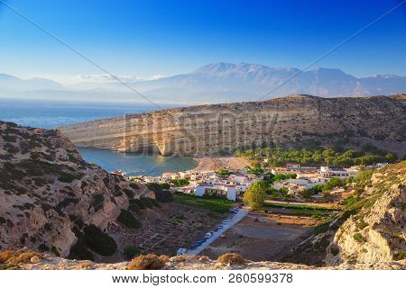 Top View Of The Bay On The Island Of Crete. Matala Caves. Famous Attraction - The Beach Of Matala.