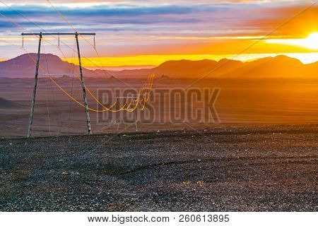 View Of Sunset With The High Voltage Cables In Central Highlands Of Iceland