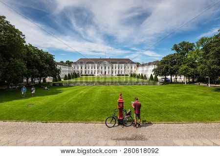 Berlin, Germany - May 28, 2017: Tourist In Front Of Bellevue Palace (schloss Bellevue), The Official