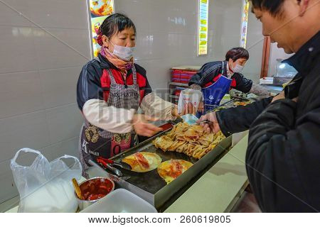 Shanghai/thailand - January 23 2015:street Food In Bus Stop From The Long Way From Shang Hai City To