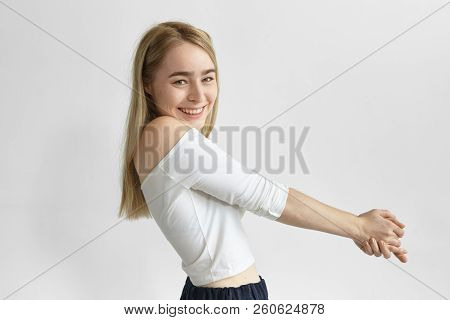 People And Lifestyle Concept. Sideways Shot Of Gorgeous Adorable Young European Woman With Staight B