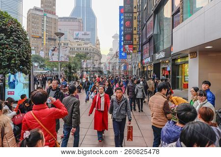 Shanghai/china -  January 24 2015: People Walking In Nanjing Road Walking Street In Shang Hai City C
