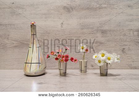 Summer Creative Still Life In Minimal Style. White And Pink Marguerite Daisy Flowers In Vintage Pear