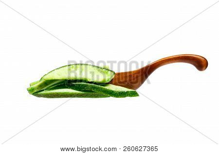 Dried Pummelo Slices In The Wooden Spoon, Isolated On White Back