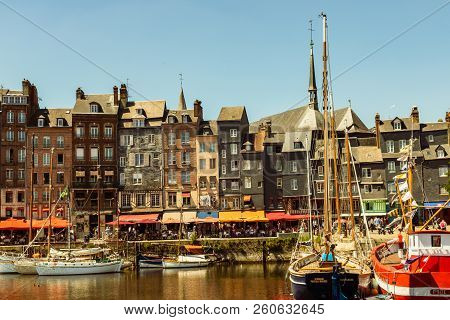 Honfleur, France - 2018.
Scenic View Of The Honfleur Harbour In Normandy, France.
Color Houses And T