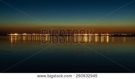 Scenic View Of The Sunset Over The Port Of Honfleur.
