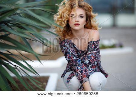 Beautiful Young Woman With Long Curly Hair, Blond, Long Black Eyelashes And Light Make-up, Cute Smil