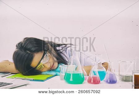 The Abstractart Design Background Of The Chemist In Protective Eyeglasses Working By Test Tube With 